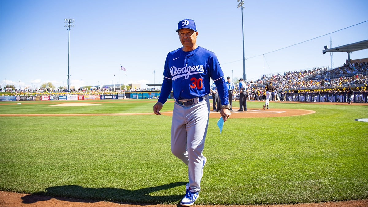 Los Angeles Dodgers manager Dave Roberts against the San Diego Padres during a spring training game at Peoria Sports Complex.
