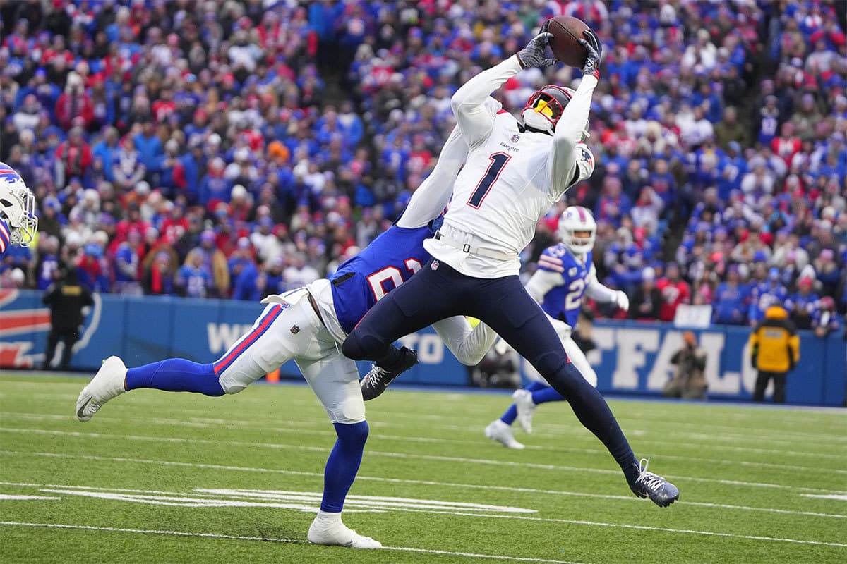 New England Patriots wide receiver DeVante Parker (1) makes a catch against the Buffalo Bills during the first half at Highmark Stadium