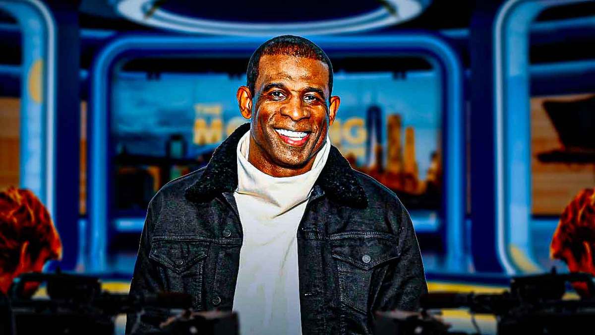 Deion Sanders smiling.