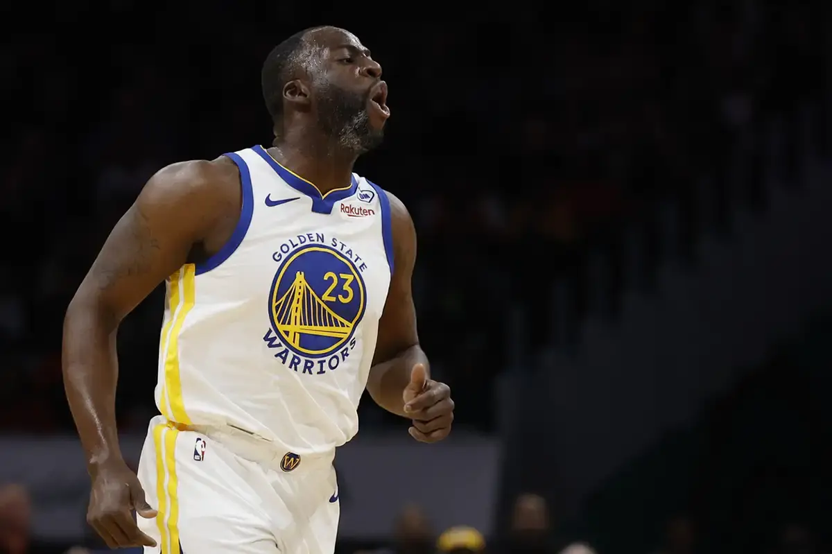 Golden State Warriors forward Draymond Green (23) reacts after making a three point field goal against the Washington Wizards in the first half at Capital One Arena.