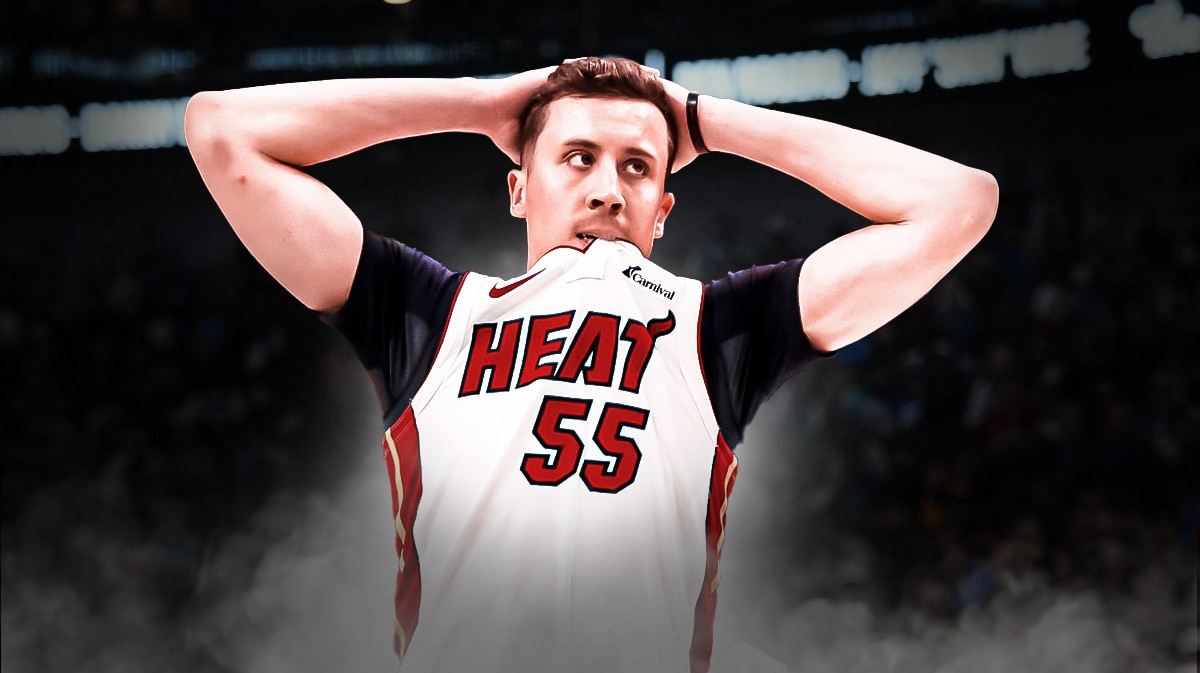 Miami Heat star Duncan Robinson looking frustrated in front of the Kaseya Center.