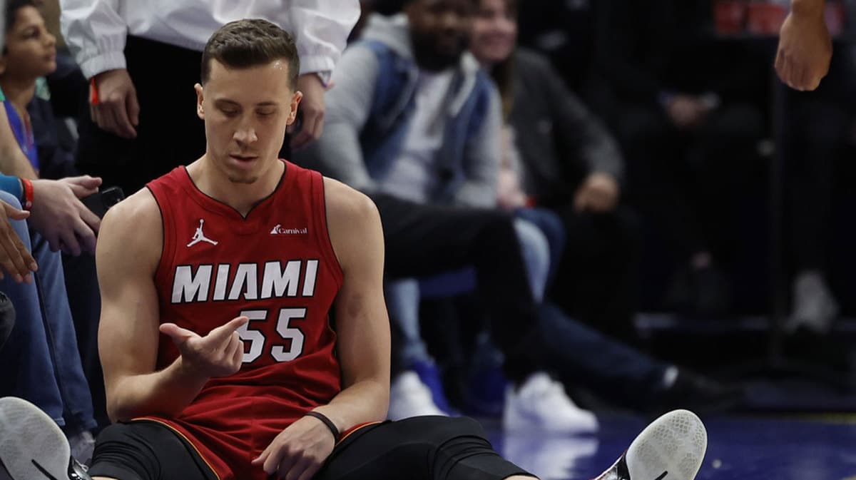Miami Heat forward Duncan Robinson (55) celebrates after he is fouled on a three point basket in the second half against the Detroit Pistons at Little Caesars Arena.