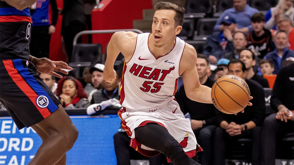 Miami Heat forward Duncan Robinson (55) dribbles the ball against the Detroit Pistons during the first quarter at Little Caesars Arena.