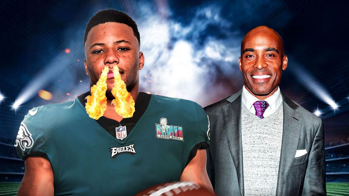 Saquon Barkley in an Eagles uniform breathing fire. Tiki Barber