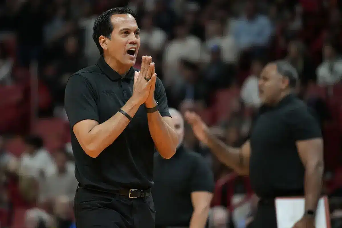 Miami Heat head coach Erik Spoelstra walks over to talk to an official during a timeout during the first half against the Orlando Magic at Kaseya Center.