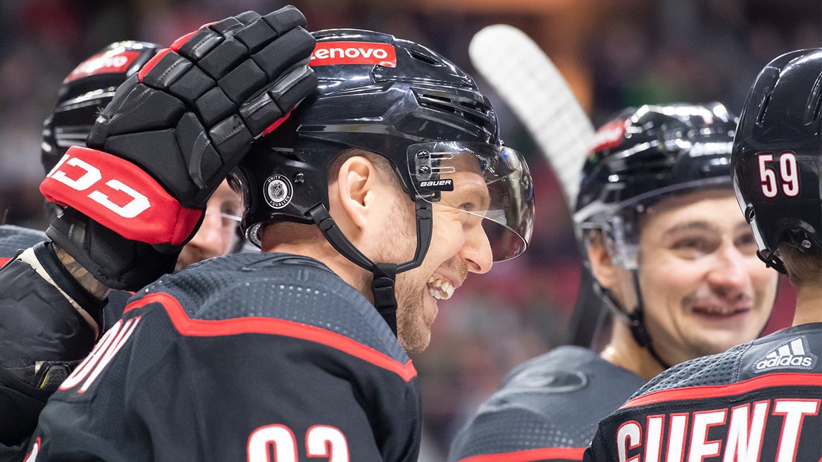 The Carolina Hurricanes celebrate a goal scored by center Evgeny Kuznetsov (92) in the second period against the Ottawa Senators at the Canadian Tire Centre.