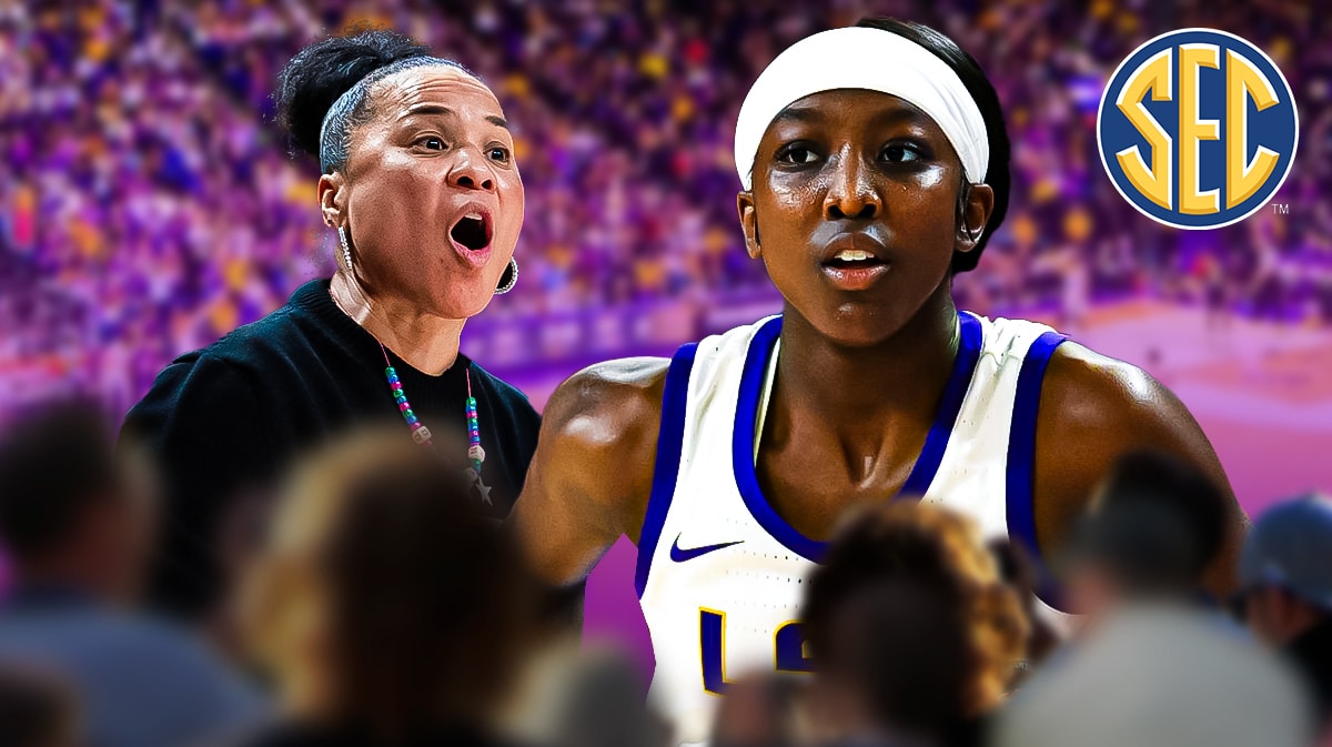 Flau'jae Johnson opposite Dawn Staley wit the SEC logo in the background, LSU South Carolina fight
