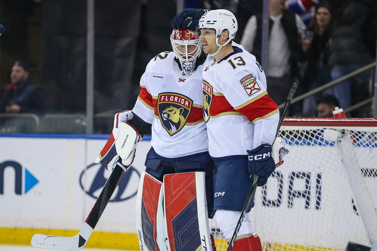 Florida Panthers center Sam Reinhart (13) celebrates with goaltender Sergei Bobrovsky (72) after defeating the New York Rangers 4-2 at Madison Square Garden.