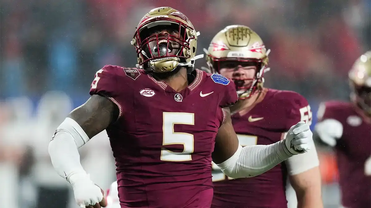 Florida State Seminoles defensive lineman Jared Verse (5) reacts during the fourth quarter against the Louisville Cardinals at Bank of America Stadium. 