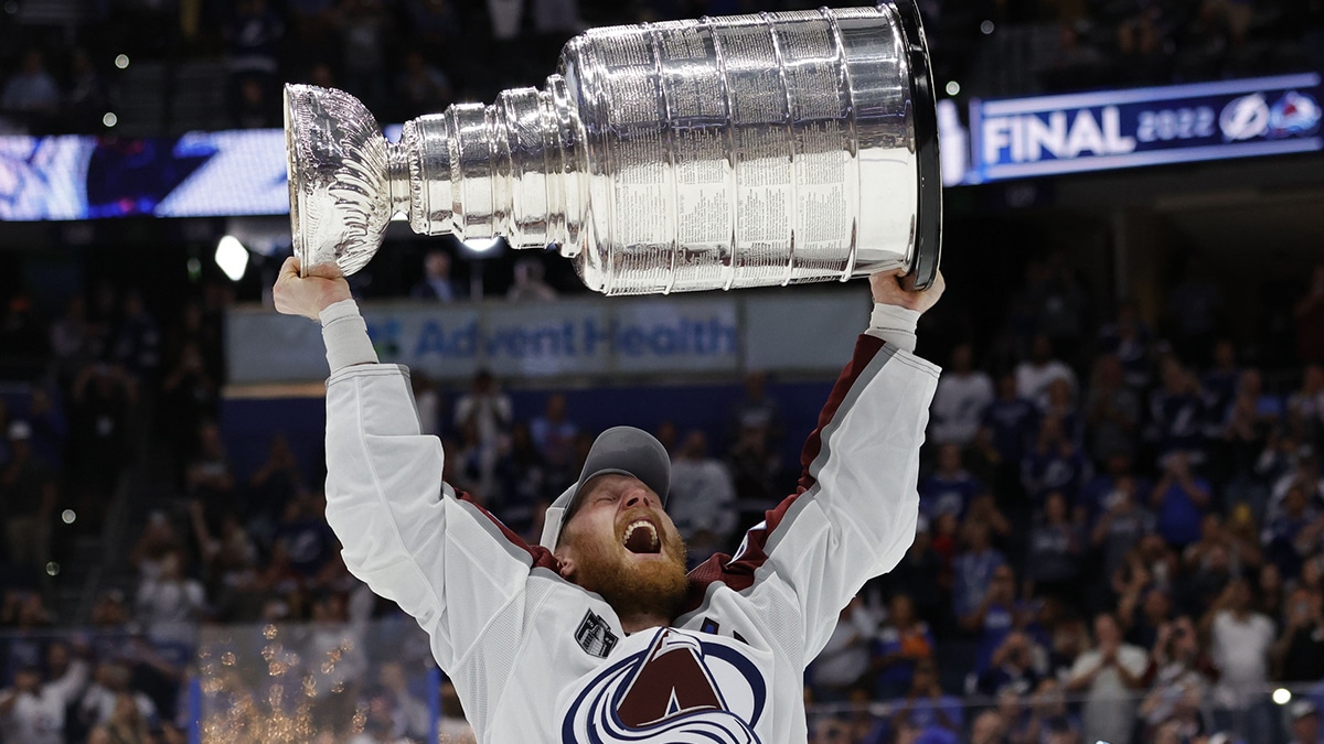 Colorado Avalanche left wing Gabriel Landeskog (92) celebrates with the Stanley Cup after the game against the Tampa Bay Lightning in game six of the 2022 Stanley Cup Final at Amalie Arena.