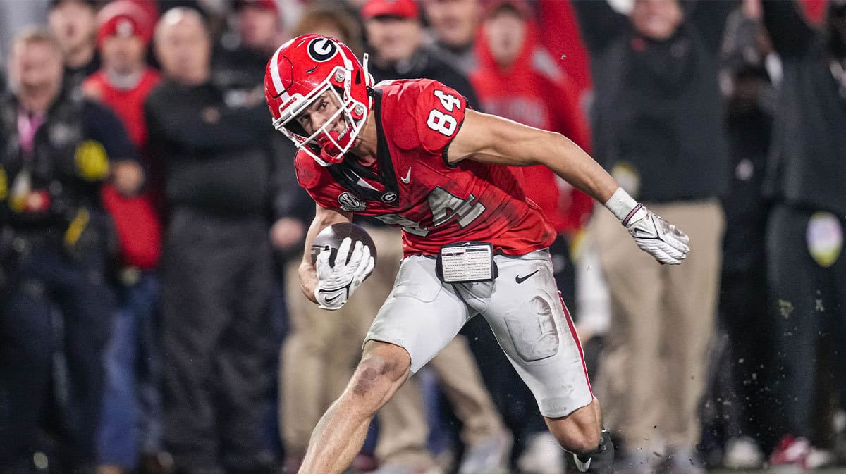 Georgia Bulldogs wide receiver Ladd McConkey (84) runs after a catch against the Mississippi Rebels during the first half at Sanford Stadium. 
