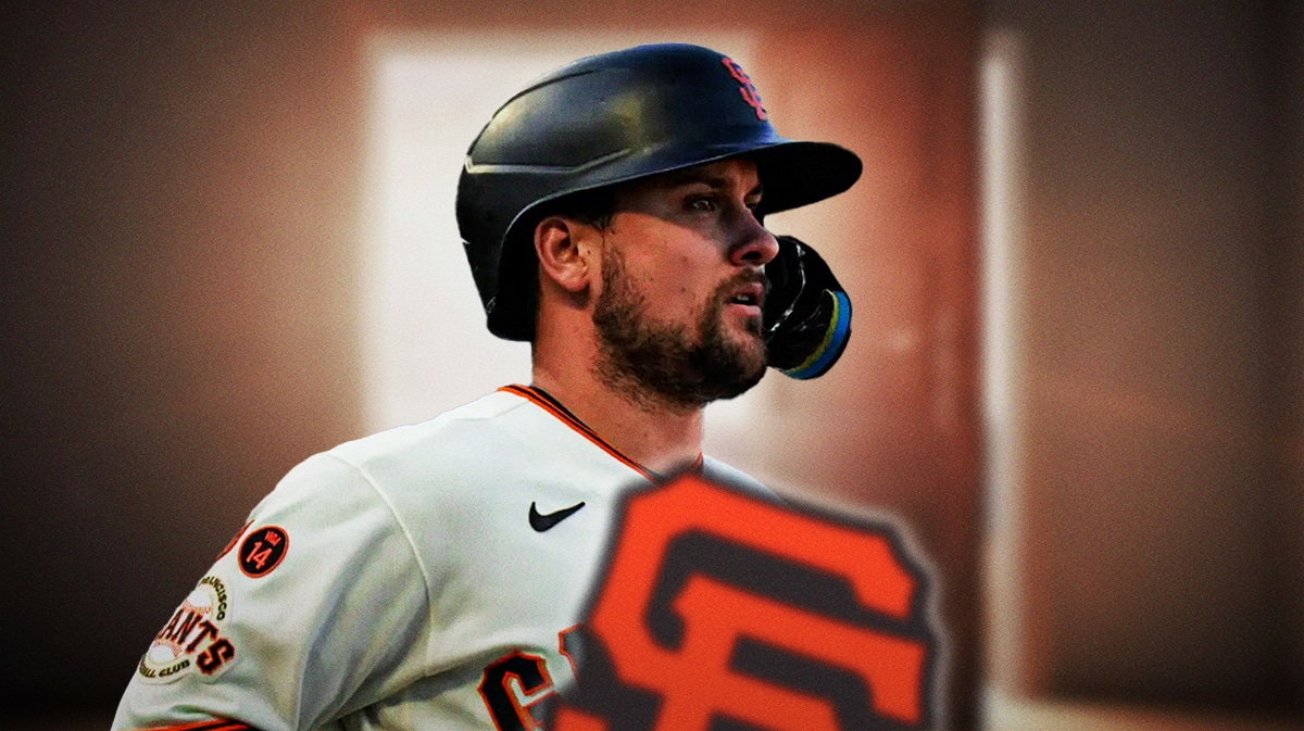 JD Davis in Giants jersey with a door open behind him.