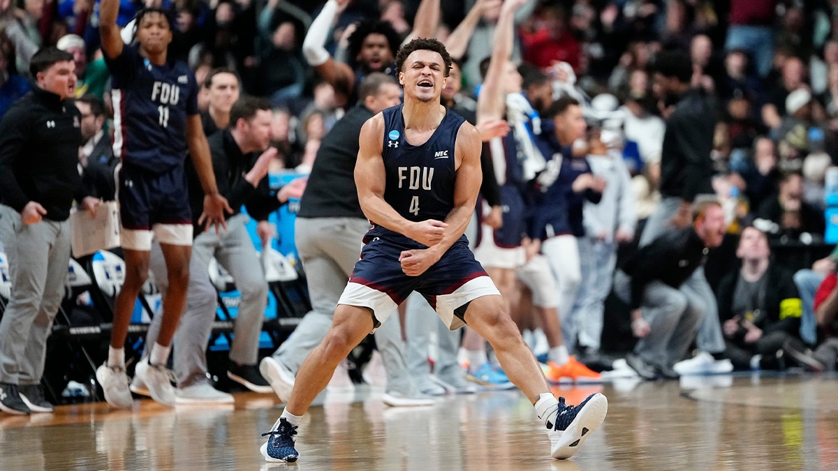 Grant Singleton celebrating after beating 1-seeded Purdue as a 16-seed