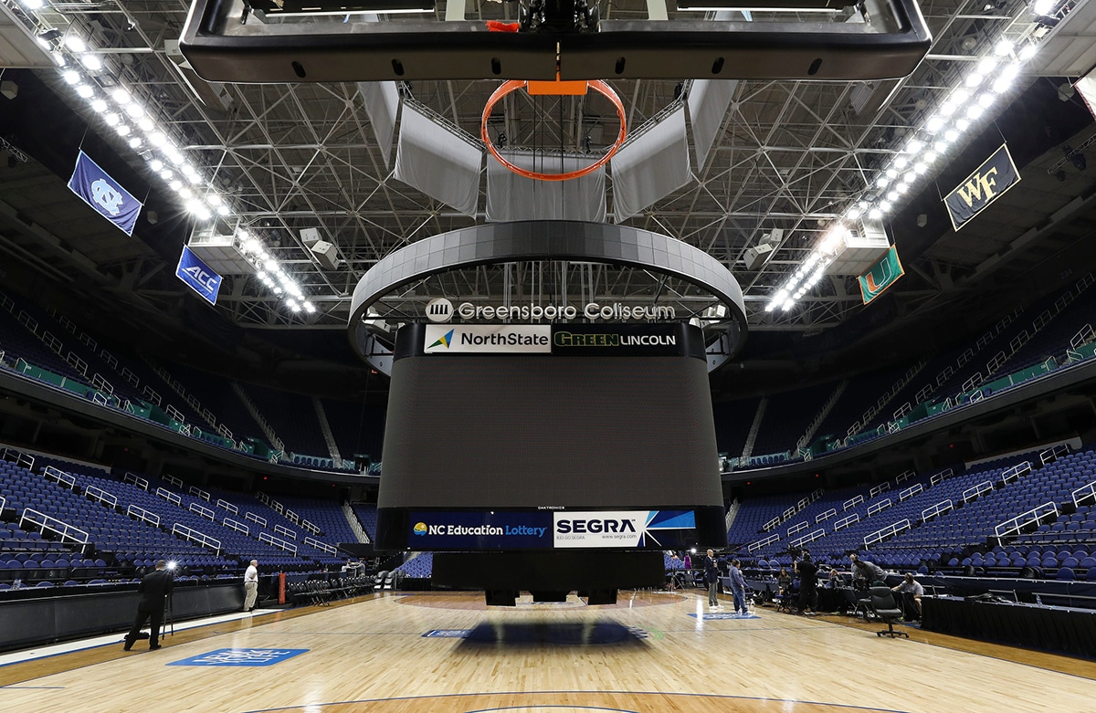 The large video display screen has been lowered inside the Greensboro Coliseum after the ACC announced that the tournament has been canceled due to concerns about the Coronavirus epidemic in Greensboro, N.C.
