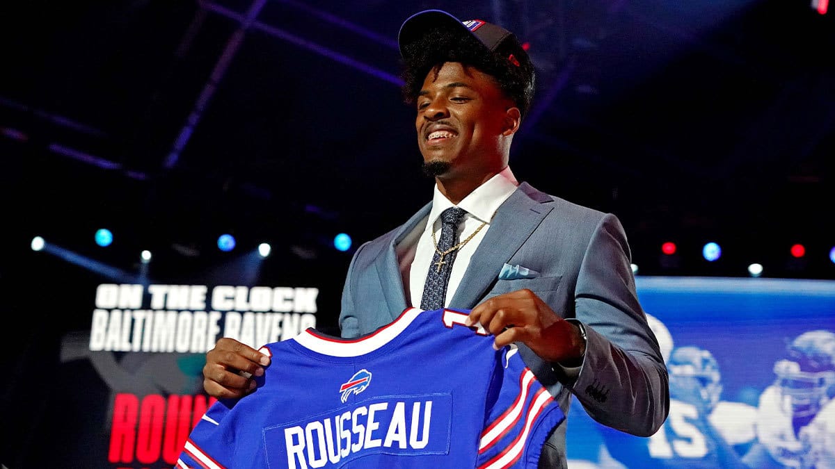 Gregory Rousseau (Miami) poses with a jersey after being selected by the Buffalo Bills as the number 30 overall pick in the first round of the 2021 NFL Draft at First Energy Stadium. 