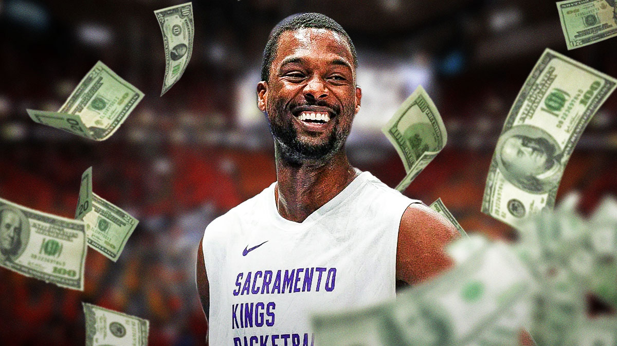 Harrison Barnes surrounded by piles of cash.