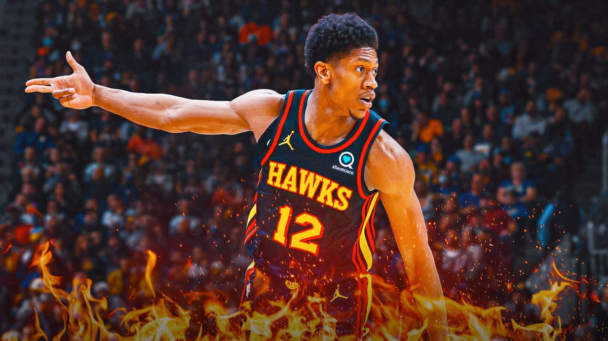 De'Andre Hunter celebrates in Atlanta Hawks jersey with fire graphic