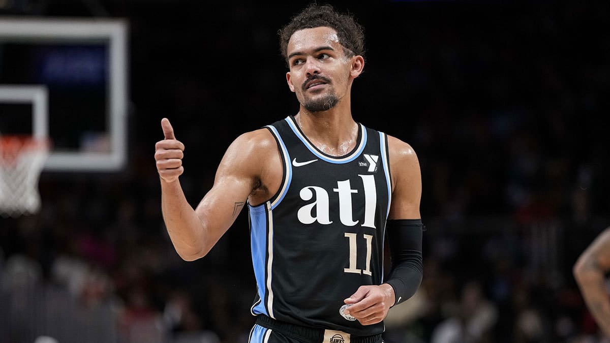 Atlanta Hawks guard Trae Young (11) gestures after being called for a technical foul against the Chicago Bulls during the second half at State Farm Arena