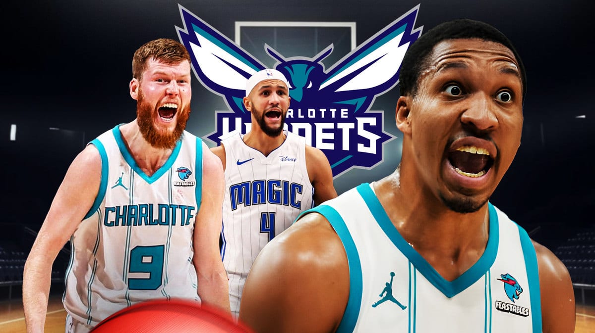 Hornets' Davis Bertans and Grant Williams stand next to Magic's Jalen Suggs