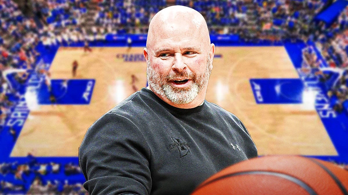 Indiana State coach Josh Schertz with Saint Louis court behind him.