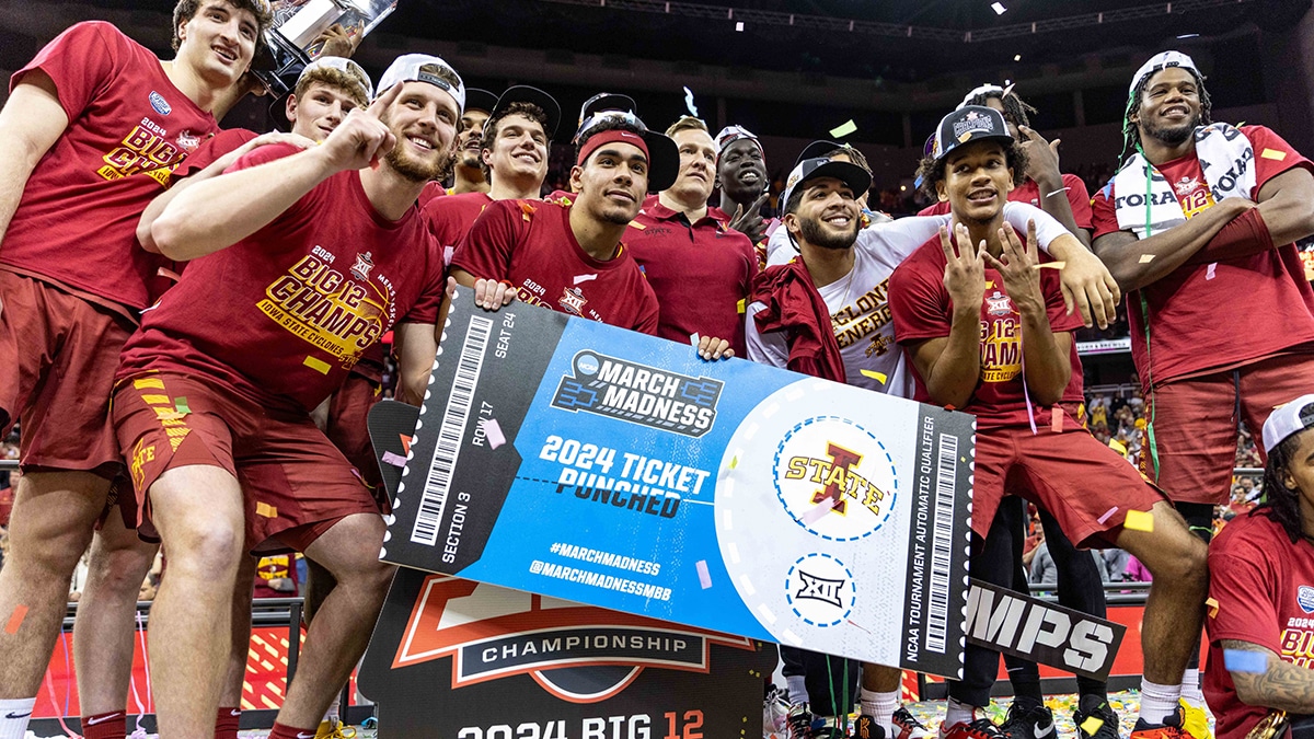 Iowa State Cyclones hold their ticket to the NCAA tournament after the game against the Houston Cougars at T-Mobile Center