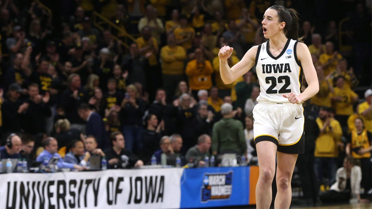 Iowa’s Caitlin Clark (22) reacts while playing West Virginia in a NCAA Tournament round of 32 game