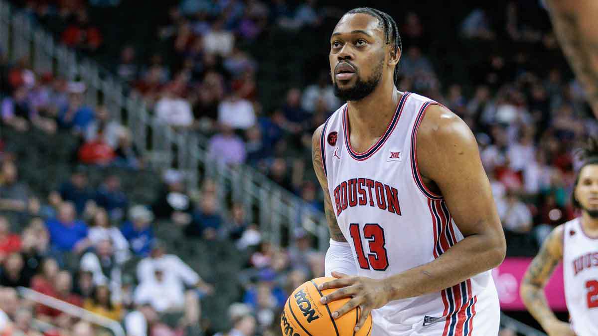 Houston Cougars forward J'Wan Roberts (13) shoots a free throw during the first half against the TCU Horned Frogs at T-Mobile Center