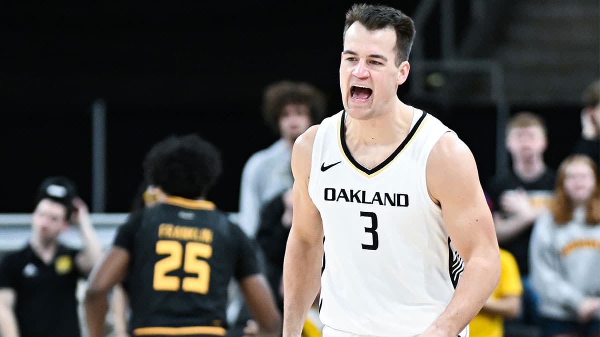 Oakland Golden Grizzlies guard Jack Gohlke (3) celebrates after a play against the Milwaukee Panthers during the first half at Indiana Farmers Coliseum