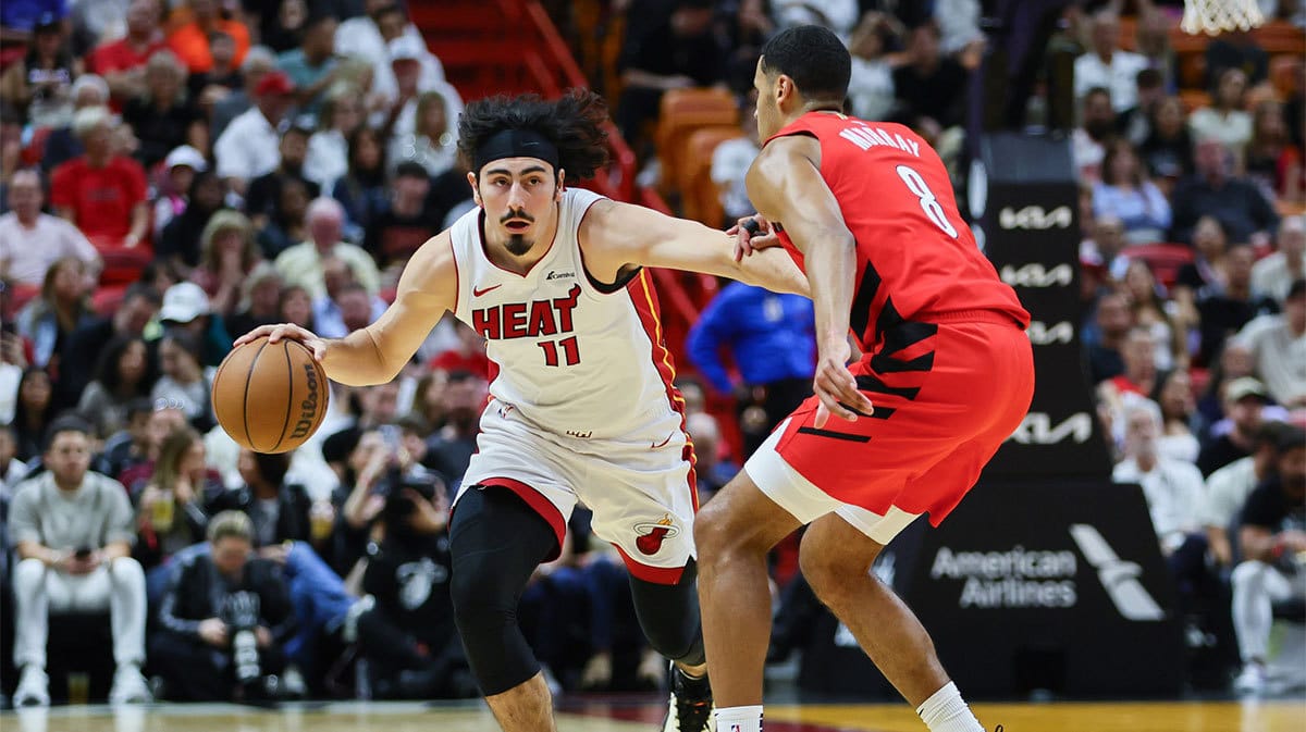 Miami Heat guard Jaime Jaquez Jr. (11) drives to the basket against Portland Trail Blazers forward Kris Murray (8) during the first quarter at Kaseya Center.