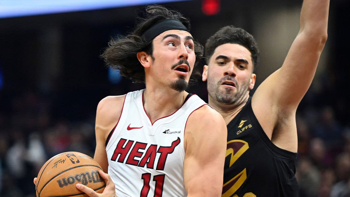  Miami Heat guard Jaime Jaquez Jr. (11) drives against Cleveland Cavaliers forward Georges Niang (20) in the second quarter at Rocket Mortgage FieldHouse.