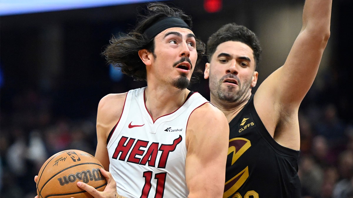 Miami Heat guard Jaime Jaquez Jr. (11) drives against Cleveland Cavaliers forward Georges Niang (20) in the second quarter at Rocket Mortgage FieldHouse.