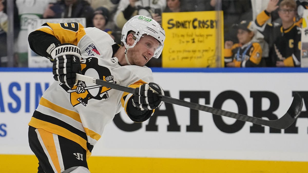 Pittsburgh Penguins forward Jake Guentzel (59) shoots the puck during warm ups before a game against the Toronto Maple Leafs at Scotiabank Arena.