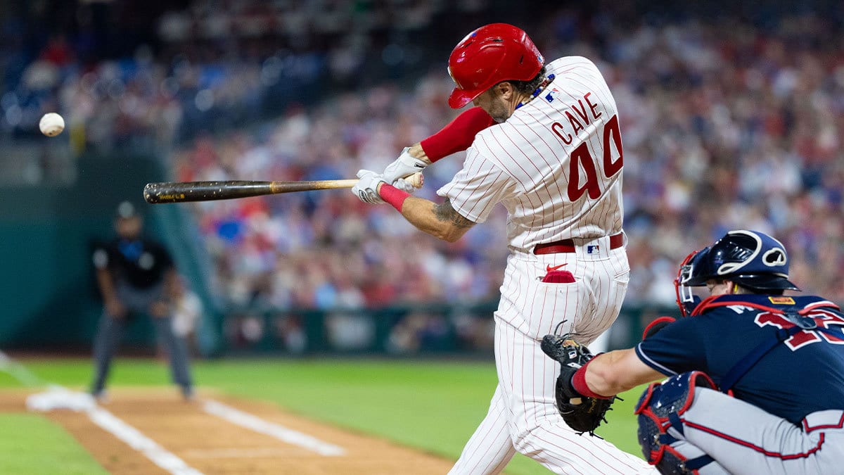 Philadelphia Phillies left fielder Jake Cave (44) hits an RBI triple during the fourth inning against the Atlanta Braves at Citizens Bank Park