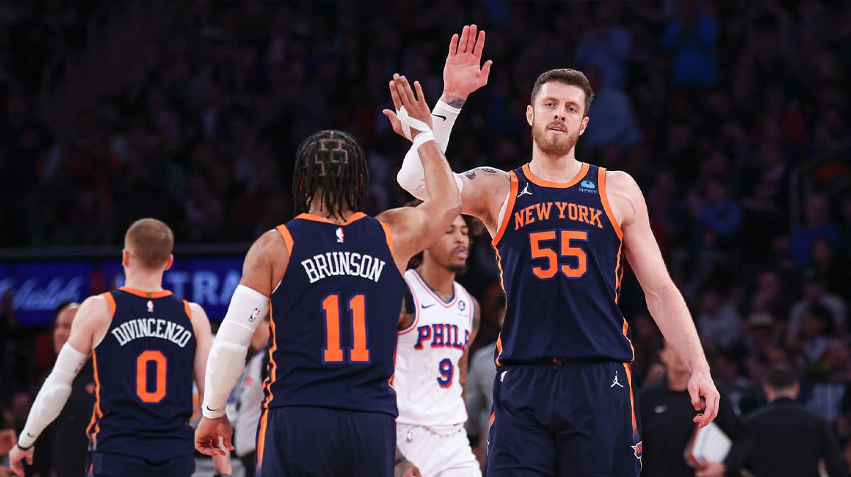 New York Knicks center Isaiah Hartenstein (55) slaps hands with guard Jalen Brunson (11) during the second quarter against the Philadelphia 76ers at Madison Square Garden. 