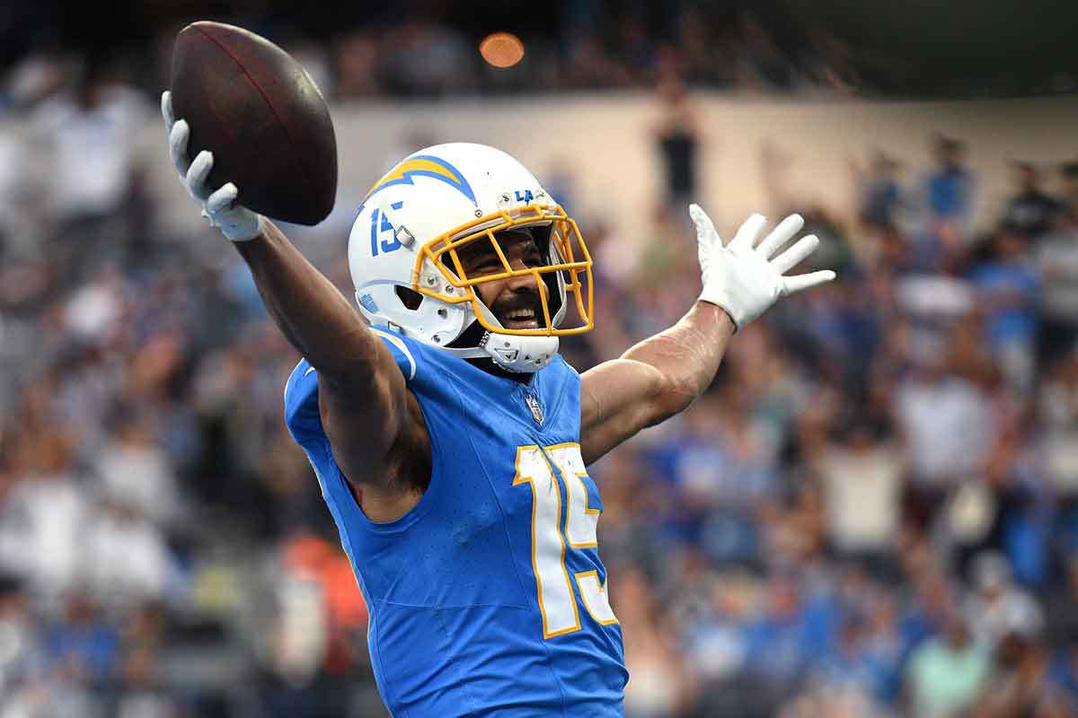 Los Angeles Chargers wide receiver Jalen Guyton (15) celebrates after scoring a touchdown against the Detroit Lions during the second half at SoFi Stadium