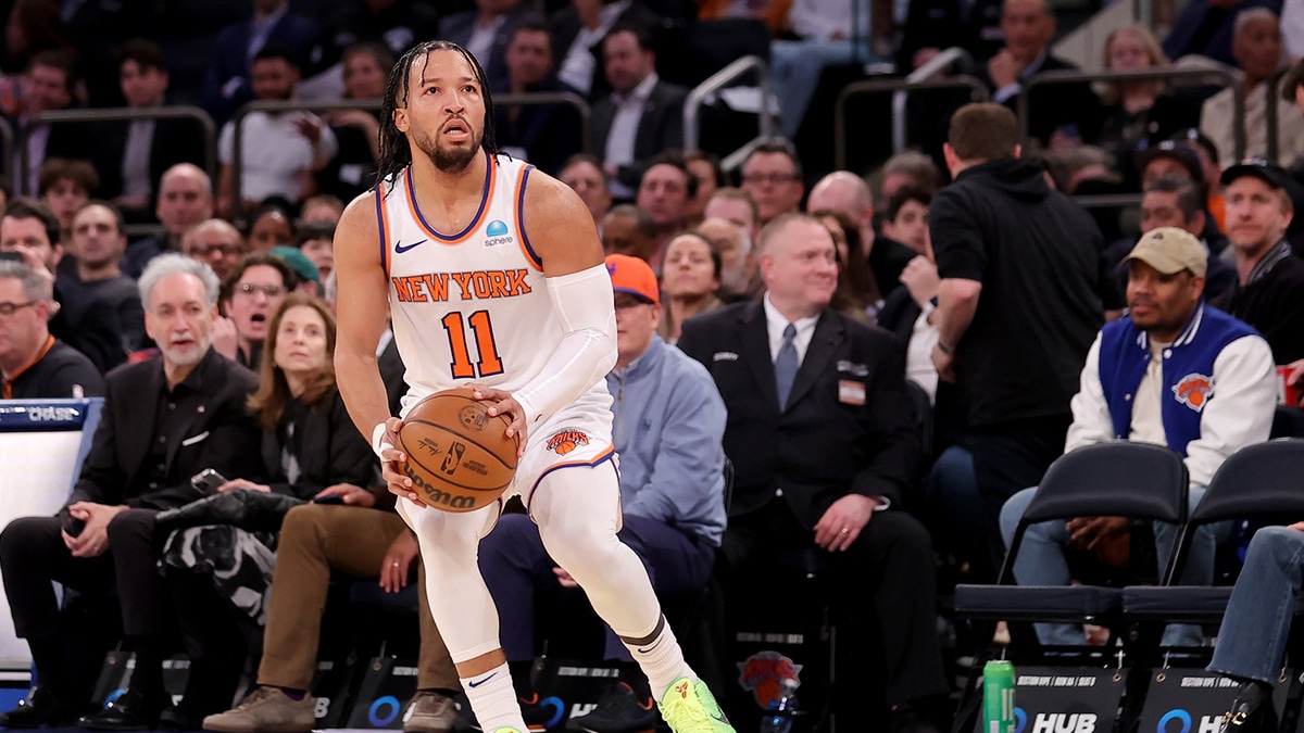 New York Knicks guard Jalen Brunson (11) looks to shoot a three point shot against the Detroit Pistons during the second quarter at Madison Square Garden