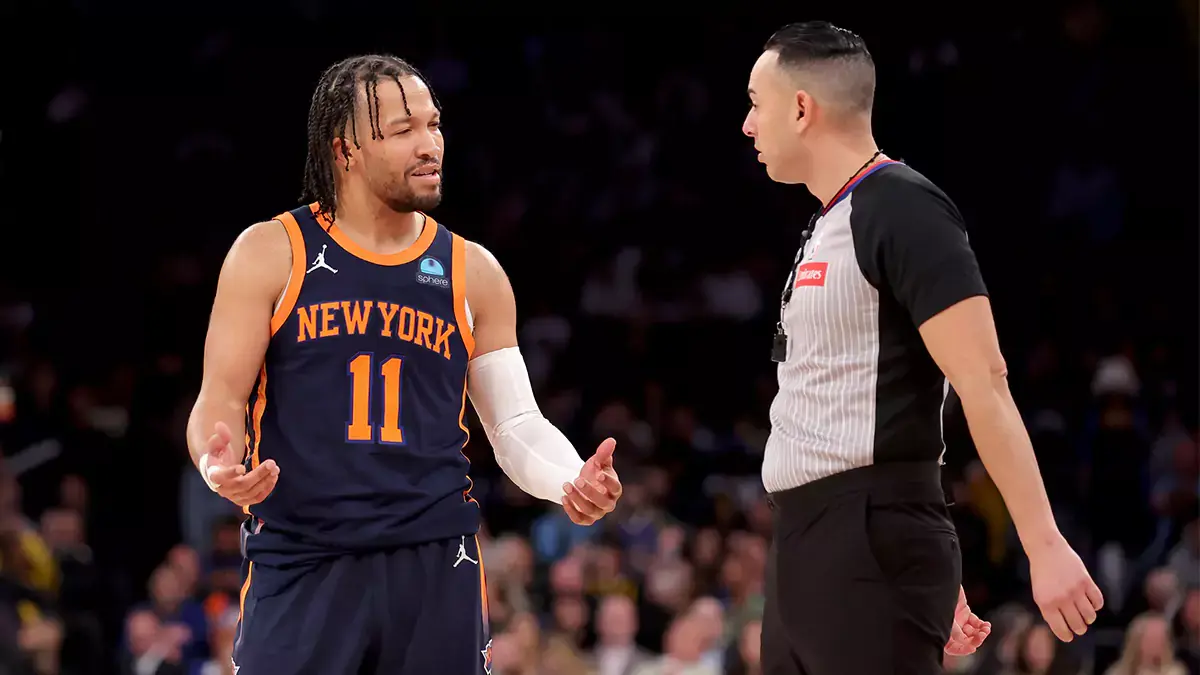 New York Knicks guard Jalen Brunson (11) argues with referee Ray Acosta (54) during the fourth quarter against the Golden State Warriors at Madison Square Garden. 