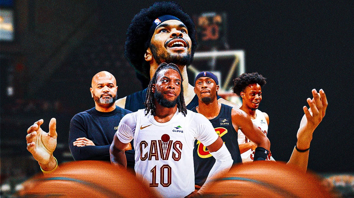 Cavs Jarrett with his arms out holding up coach JB Bickerstaff and teammates Darius Garland, Caris LeVert, and Isaac Okoro