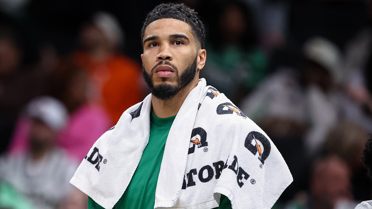 Boston Celtics forward Jayson Tatum (0) looks on from the bench against the Washington Wizards during the second half of the game at Capital One Arena.