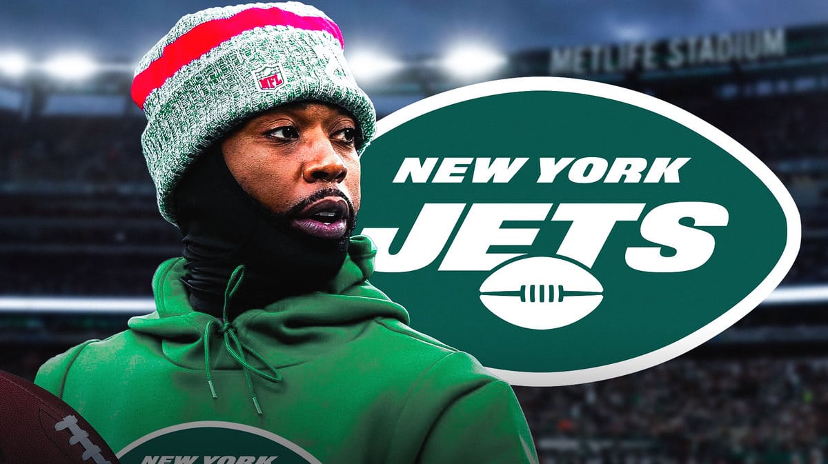 Tyrod Taylor with New York Jets logo in the back