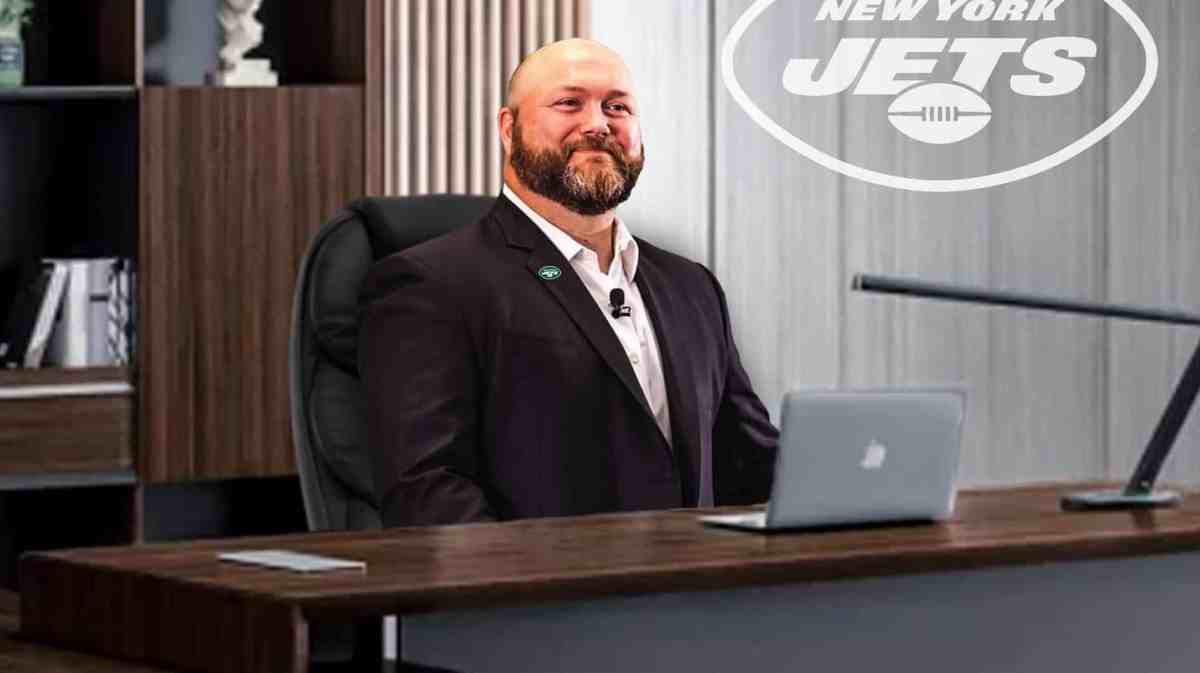 Jets GM Joe Douglas sits at desk