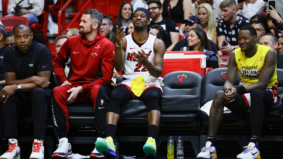  Miami Heat forward Jimmy Butler (22) reacts from the bench against the Portland Trail Blazers during the fourth quarter at Kaseya Center. 