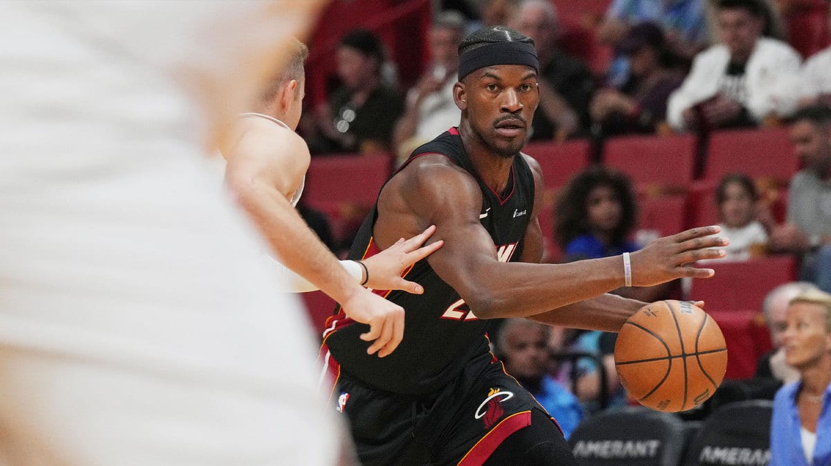 Miami Heat forward Jimmy Butler (22) looks to pass the ball against the Cleveland Cavaliers during the first half at Kaseya Center.