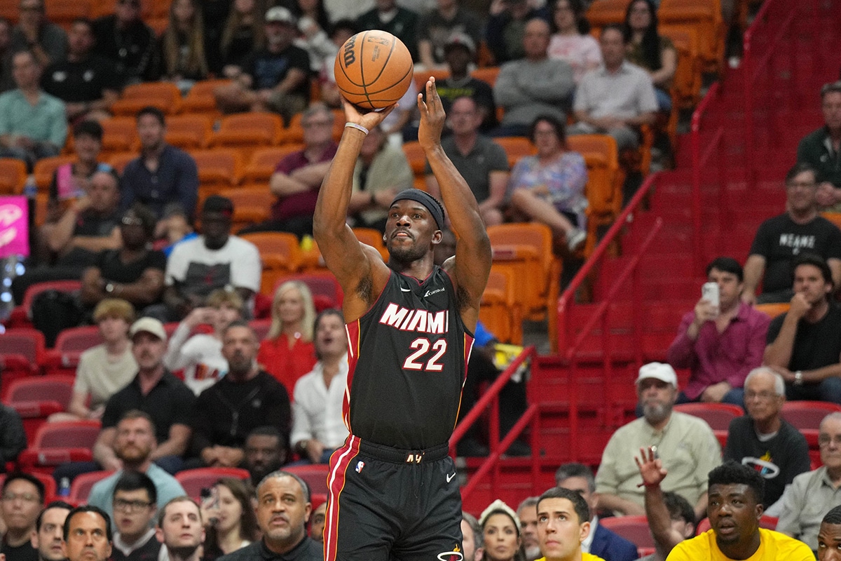 Miami Heat guard Jimmy Butler (22) attempts a shot against the Cleveland Cavaliers during the first half at Kaseya Center.