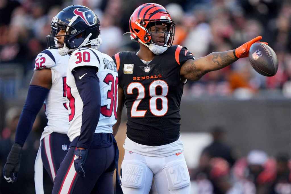 Cincinnati Bengals running back Joe Mixon (28) signals for a first down after a run in the fourth quarter of a Week 10 NFL football game between the Houston Texans and the Cincinnati Bengals, Sunday, Nov. 12, 2023, at Paycor Stadium in Cincinnati. The Houston Texans won, 30-27.