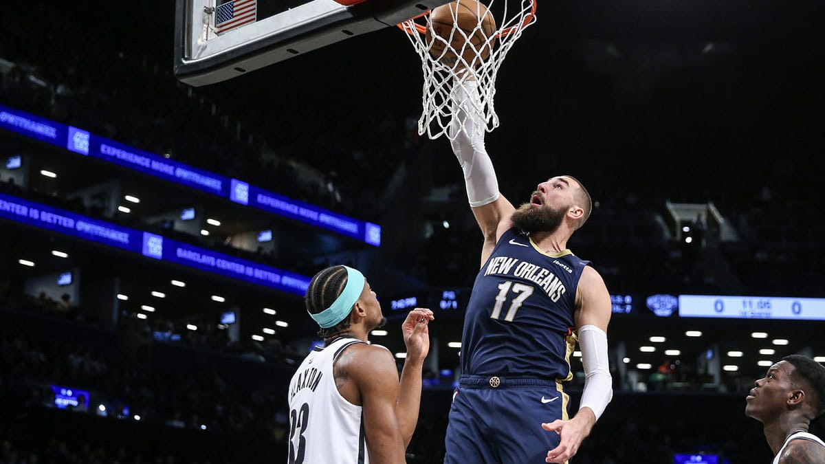 New Orleans Pelicans center Jonas Valanciunas (17) dunks over Brooklyn Nets center Nic Claxton