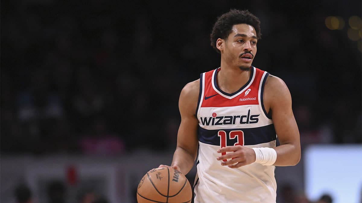 Washington Wizards guard Jordan Poole (13) dribbles at the top of the key during the second half against the Sacramento Kings at Capital One Arena