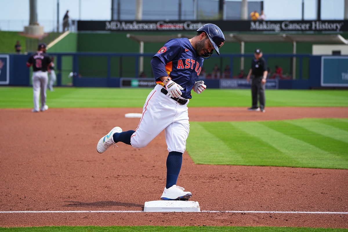 Houston Astros second baseman Jose Altuve (27) rounds third base after hitting a solo home run in the first inning against the Washington Nationals at CACTI Park of the Palm Beaches. 