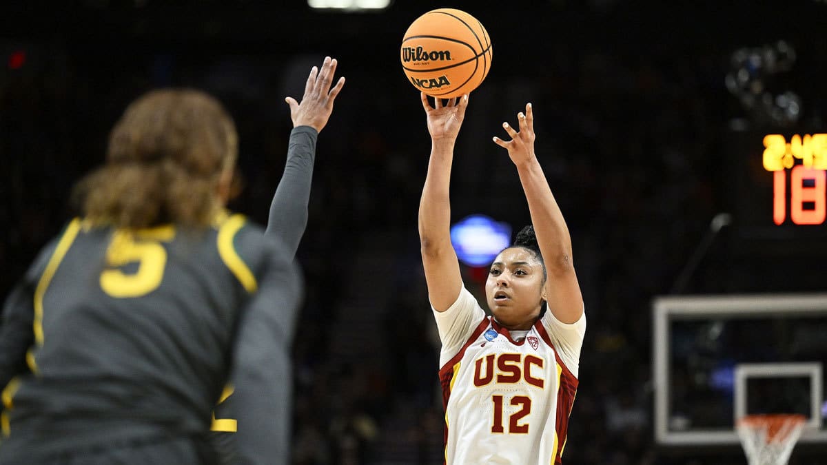 Mar 30, 2024; Portland, OR, USA; USC Trojans guard JuJu Watkins (12) shoots a jump shot during the second half against Baylor Lady Bears guard Darianna Littlepage-Buggs (5) in the semifinals of the Portland Regional of the 2024 NCAA Tournament at the Moda Center. 