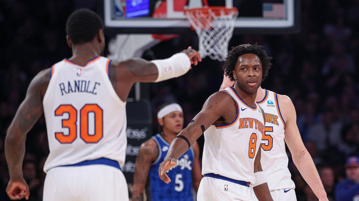 New York Knicks forward OG Anunoby (8) celebrates with forward Julius Randle (30) after a basket against the Orlando Magic during the first half at Madison Square Garden. 